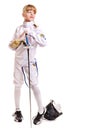 Child in fencing costume holding epee .