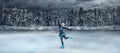 child  figure skater on winter lake  background Royalty Free Stock Photo