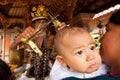 Child during the first ceremony for baby on Bali