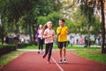 Child fitness, twins kids running on stadium track in city park , training and children sport healthy lifestyle. Outdoor Royalty Free Stock Photo