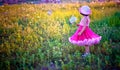 Child in a flower field