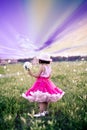 Child in a flower field