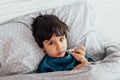 Child flu sick, boy with medical thermometer in mouth, health illness. Kid with cold rhinitis, Royalty Free Stock Photo