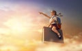 Child flying on the book Royalty Free Stock Photo