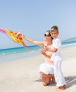 Child flying kite beach outdoor. Royalty Free Stock Photo