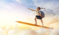 Child flying on a pencil Royalty Free Stock Photo