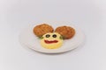Child food. Funny food. Plate with cutlets and mashed potatoes in the form of a monkey faces. Children`s menu. Royalty Free Stock Photo