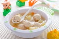 Child food: soup with potatoes and turkey meatballs