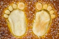 Child footprints on bap Royalty Free Stock Photo