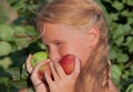 Child (girl) with apples