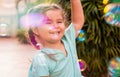 Child girl catching soap bubbles Royalty Free Stock Photo