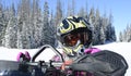 Child, girl, closeup riding snowmobile