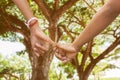 Child girl couple in love holding hands