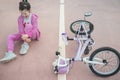 Child girl crying after bike accident