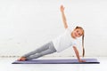 Child girl doing yoga and gymnastics in gym Royalty Free Stock Photo