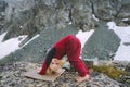 Child girl doing yoga gymnastics outdoor hiking in mountains travel adventure family vacations Royalty Free Stock Photo