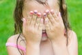 Child girl don`t see, covering her eyes and face by hands Royalty Free Stock Photo