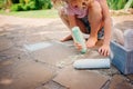 Child girl drawing with chalks in summer Royalty Free Stock Photo