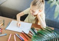 Child girl drawing with colorful pencils Royalty Free Stock Photo