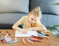 Child girl drawing with colorful pencils Royalty Free Stock Photo