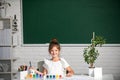 Child girl drawing with coloring pens paintind. Portrait of adorable little girl smiling happily while enjoying art and