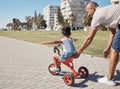 Child, girl or father pushing bike on city promenade for riding learning, cycling education or Brazilian freedom fun Royalty Free Stock Photo