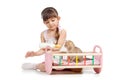 Child girl feeding and playing kitten cat Royalty Free Stock Photo