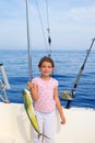 Child girl fishing in boat with mahi mahi dorado fish catch Royalty Free Stock Photo