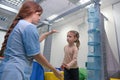 Child girl give five physiotherapist during sensory integration session Royalty Free Stock Photo