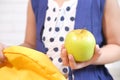 child girl green apple on white background Royalty Free Stock Photo