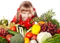 Child girl with group of vegetable and fruit. Royalty Free Stock Photo