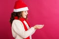 Child girl is holding fake snow in hands Royalty Free Stock Photo