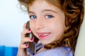 Child girl indented talking mobile telephone Royalty Free Stock Photo