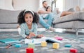 Child, girl or kid drawing in book and relax parents on digital tablet in house or family home living room. Portrait Royalty Free Stock Photo