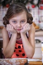 Child girl in the kitchen Royalty Free Stock Photo
