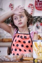 Child girl in the kitchen Royalty Free Stock Photo