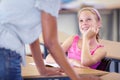 Child, girl and listening, student and teacher with interest in information and learning in classroom. Attention, smart Royalty Free Stock Photo