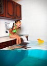 Child girl make mess, flooded kitchen imitating swimming pool, f Royalty Free Stock Photo