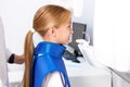 child girl patient doing panoramic teeth x-ray orthopantomography in clinic Royalty Free Stock Photo
