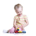 Child girl playing with color toys Royalty Free Stock Photo