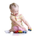 Child girl playing with color toys Royalty Free Stock Photo