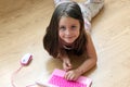 Child girl playing with laptop toy Royalty Free Stock Photo