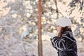 Child girl playing with snow in winter forest Royalty Free Stock Photo