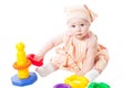 Child girl playing with toy pyramid Royalty Free Stock Photo