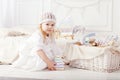 Child girl playing with a wooden toy pyramid. Little cute girl with  natural toys Royalty Free Stock Photo