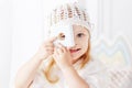 Child girl playing with a wooden toy pyramid. Little cute girl with  natural toys Royalty Free Stock Photo