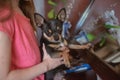 Child girl plays with little dog black hairy chihuahua doggy Royalty Free Stock Photo