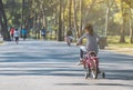 Child girl practicing biking bicycle