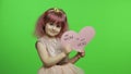 Child girl princess holds pink paper heart with text about mother. Mother`s day Royalty Free Stock Photo