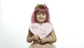 Child girl princess holds pink paper heart with text about mother. Mother`s day Royalty Free Stock Photo